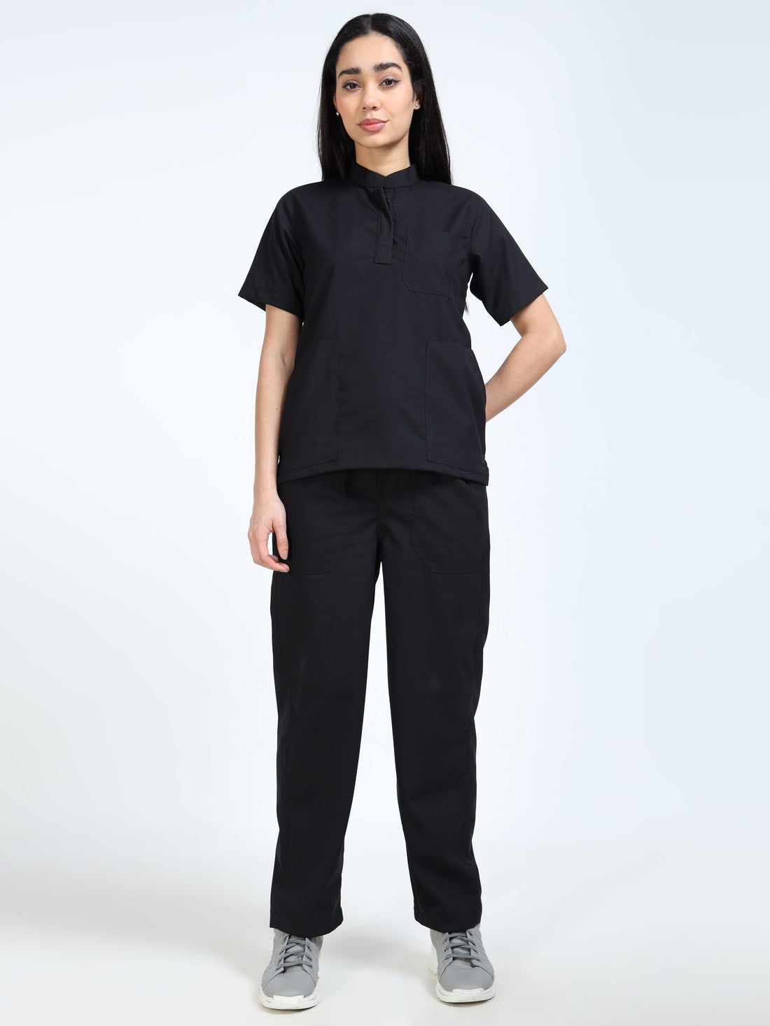Female doctor wearing premium Mandarin collar medical scrubs with matching trousers