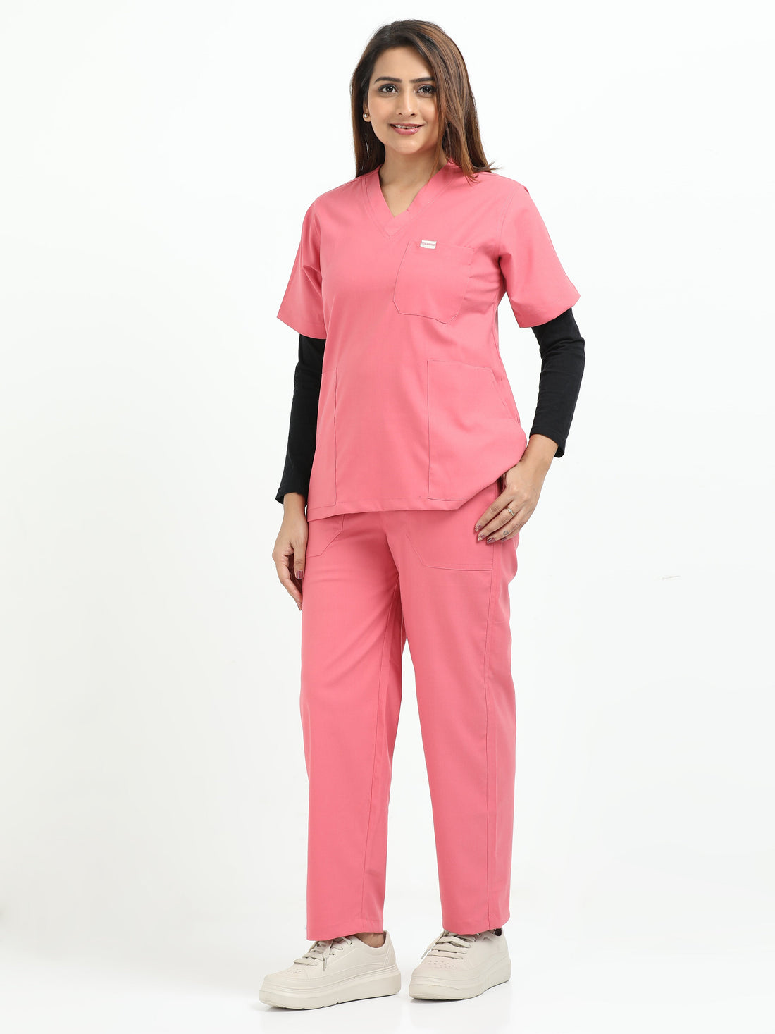 Female healthcare professional wearing V-neck scrubs for long hospital shifts