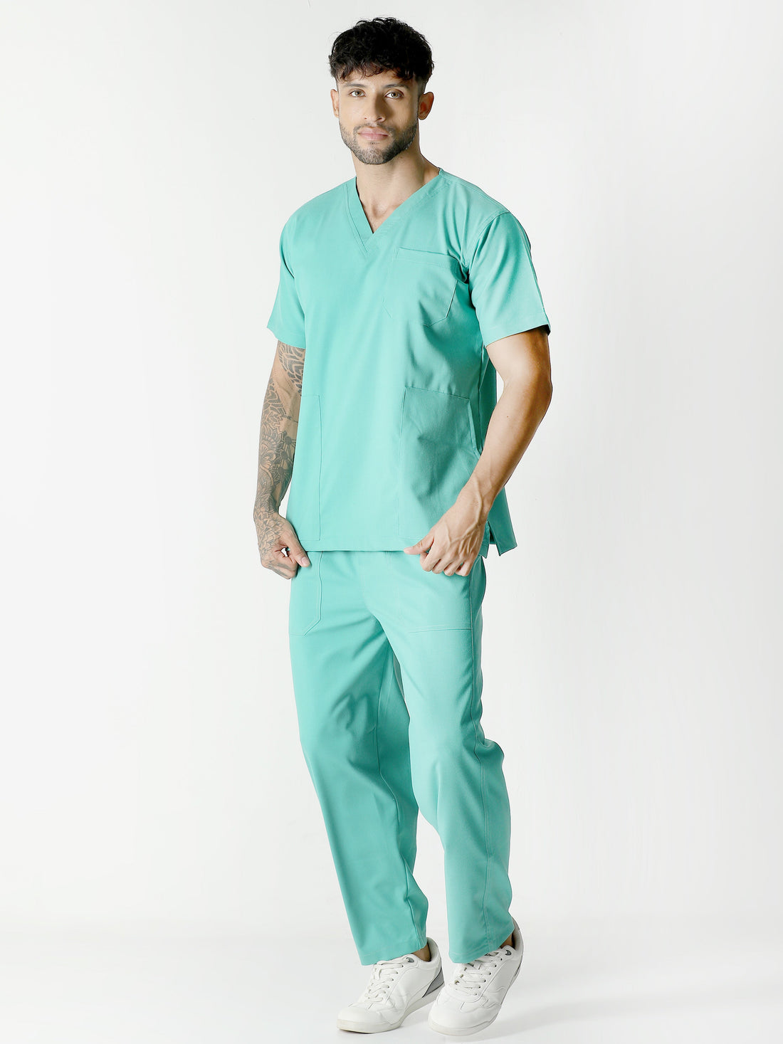 Understand the advantages of V-neck scrubs over other designs in healthcare settings.